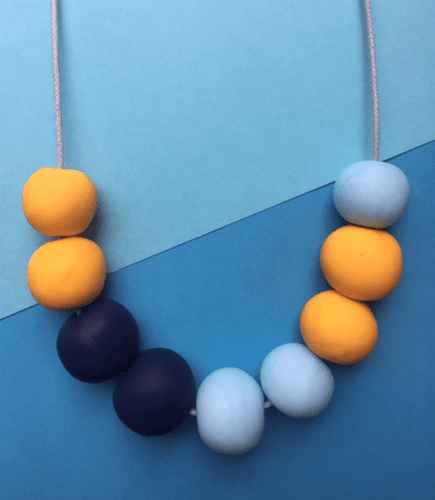 Nine Angels Navy, yellow and pastel blue necklace