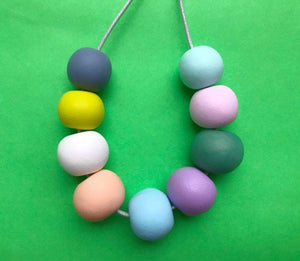 Nine Angels Pastel clay bead necklace